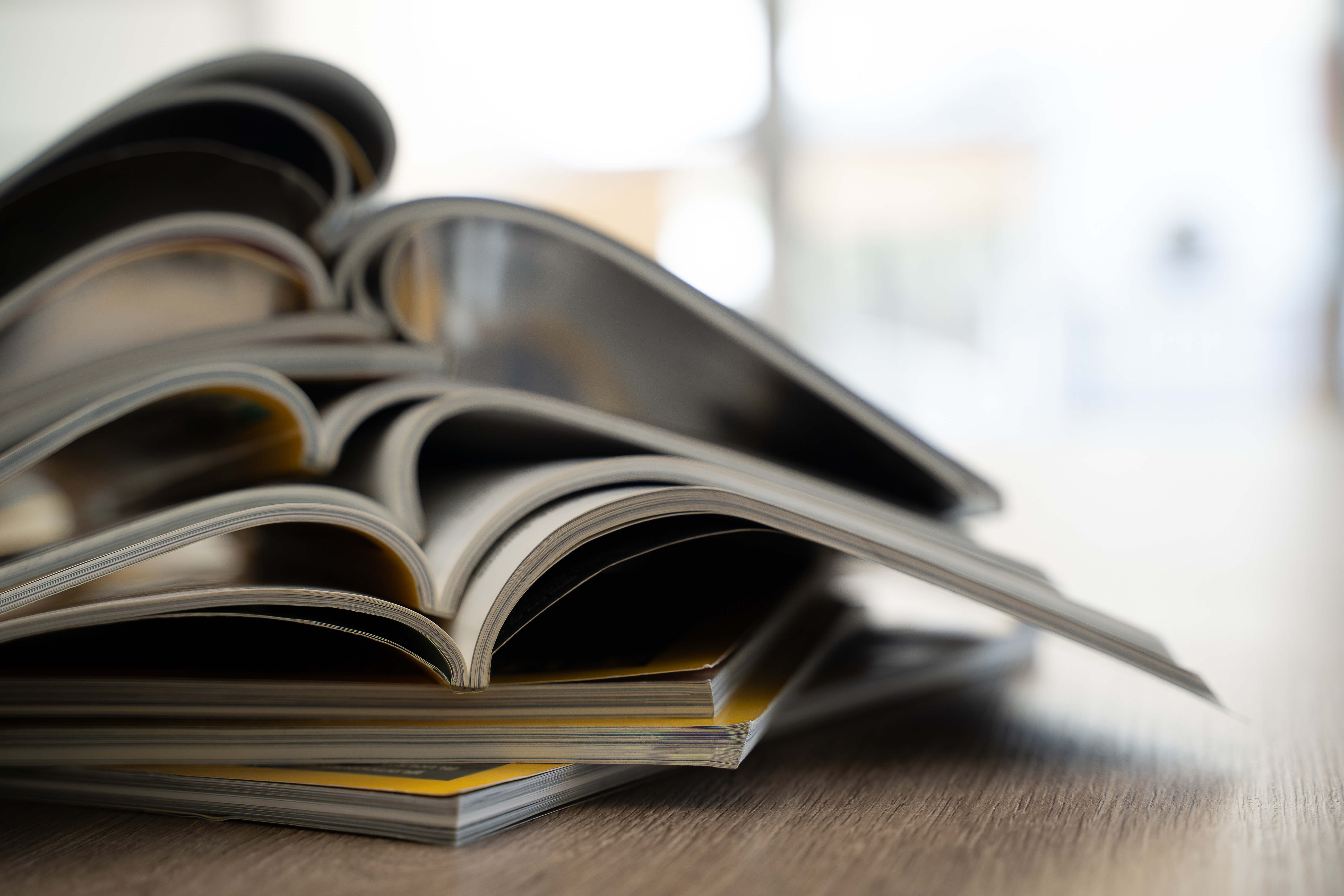 A crooked stack of magazines.